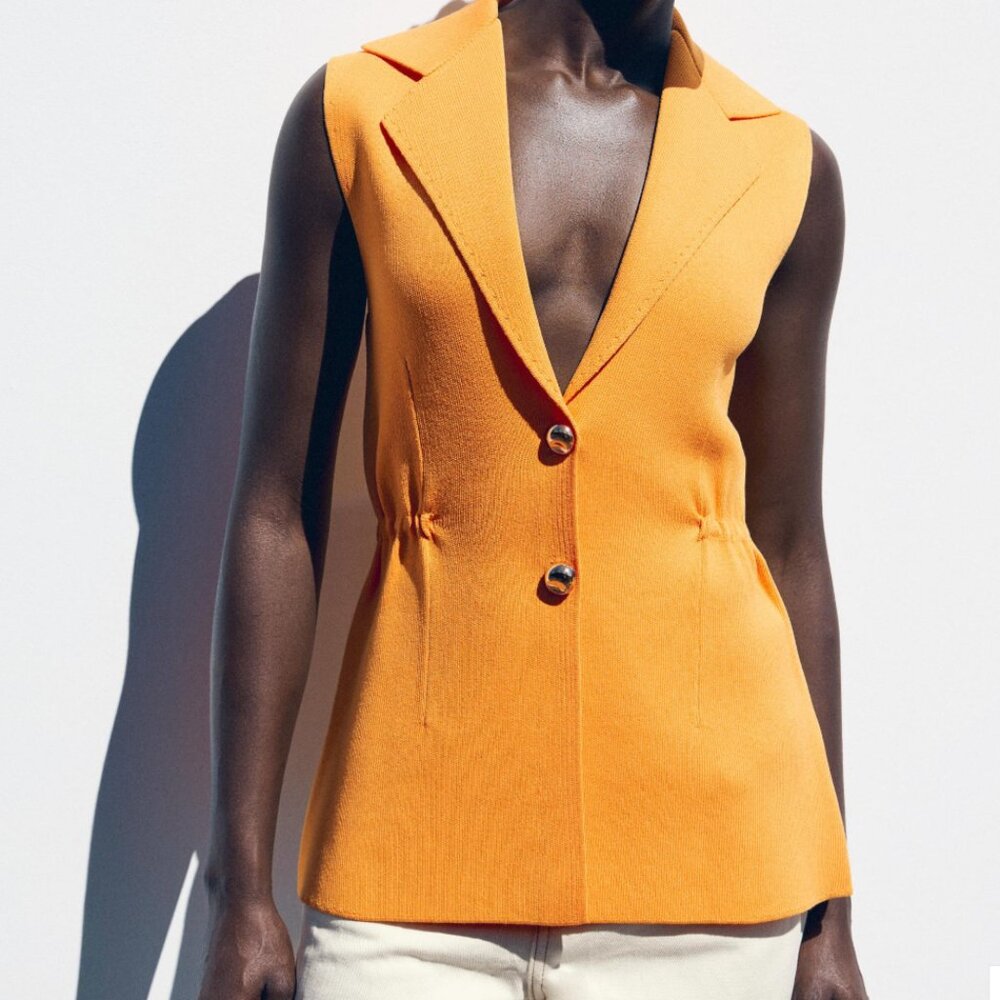 RUFFLED WAIST VEST TOP